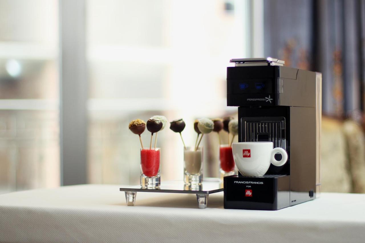Orion Hotel Bichkek Extérieur photo A Nespresso Vertuoline coffee machine