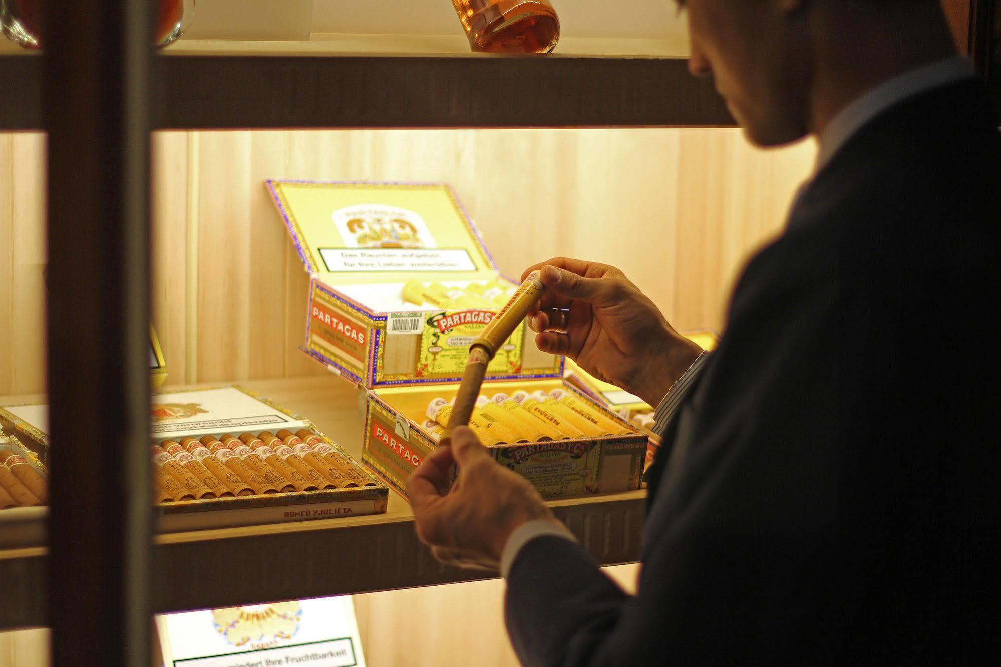 Orion Hotel Bichkek Extérieur photo A cigar shop in Madrid, Spain